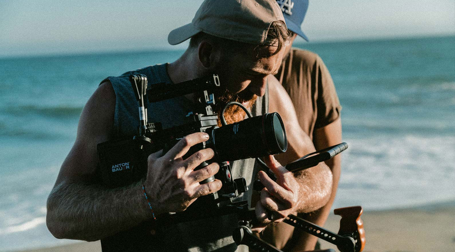 Man Holding Camera info-8