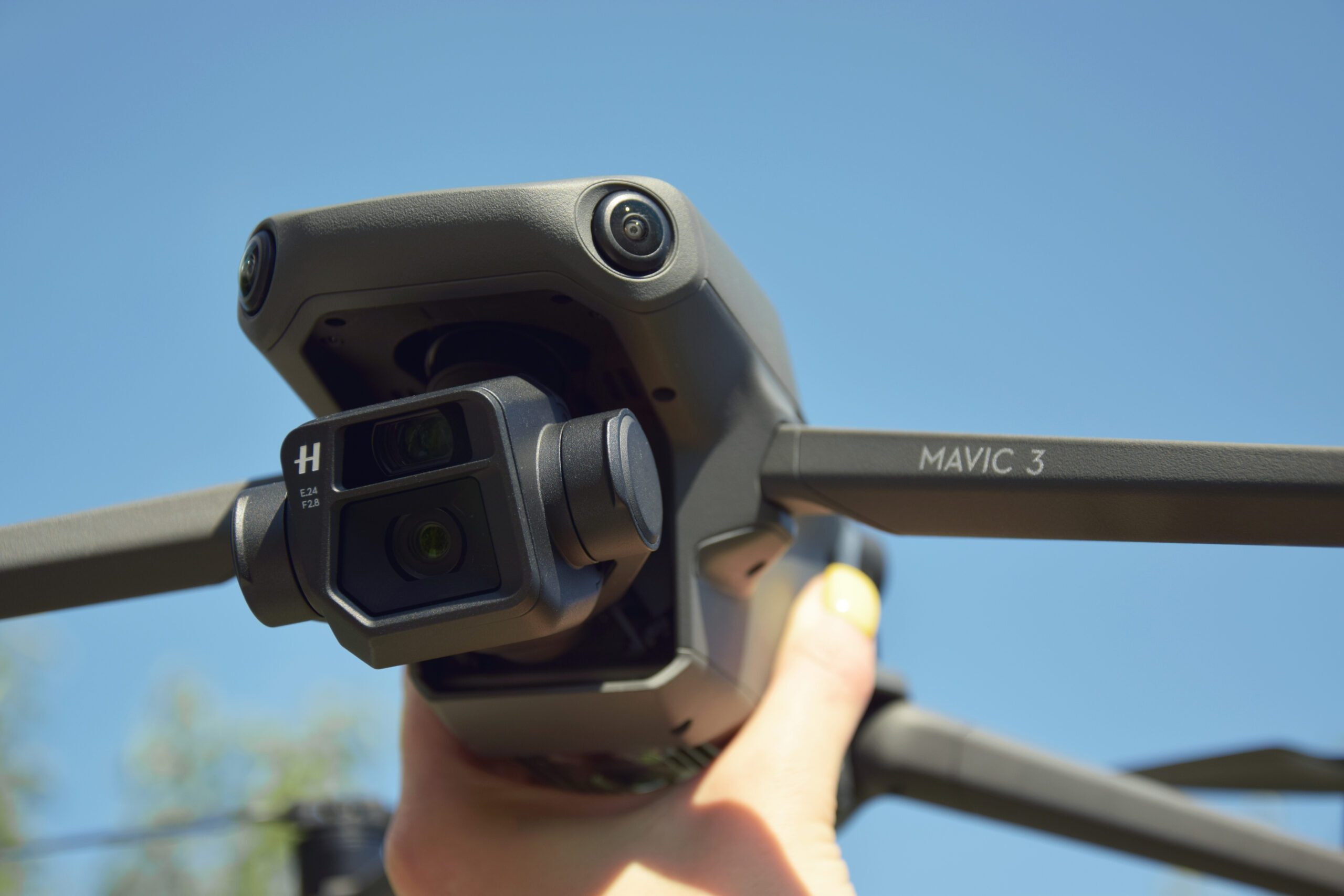 A new DJI Mavic 3 drone on blue sky background